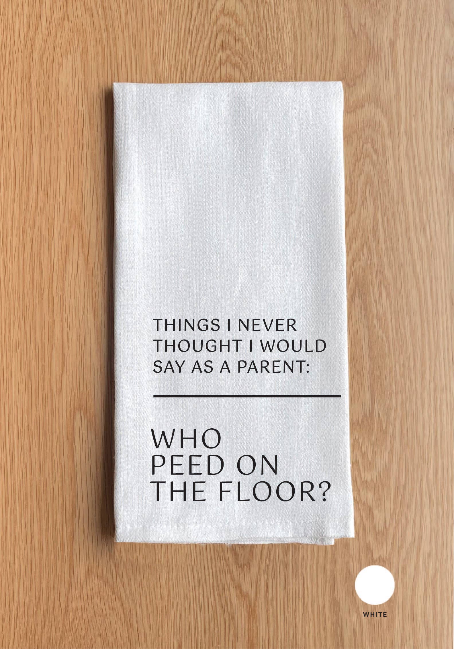 … Who peed on the floor? White Kitchen Towel