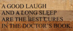 A good laugh and a long sleep are the best cures in the doctor's book. / 14"x6" Reclaimed Wood Sign