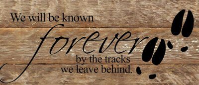 We will be know forever by the tracks we leave behind. / 14"x6" Reclaimed Wood Sign