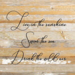 Live in the sunshine. Swim the sea. Drink the wild air. / 28"x28" Reclaimed Wood Sign