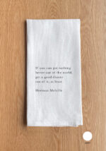 If you can get nothing better out of the world, get a good dinner out of it, at least - Herman Melville Kitchen Towel
